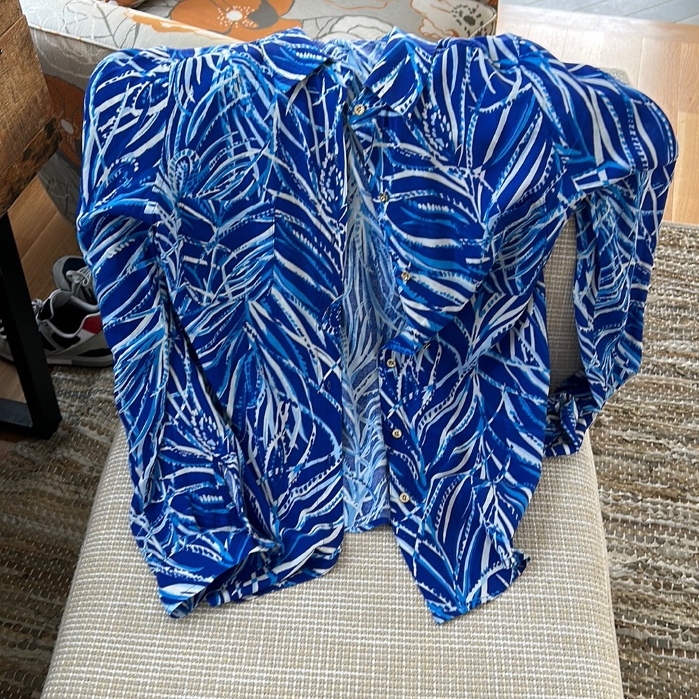 Rayon blouse, new with tags, size small. Long sleeve.